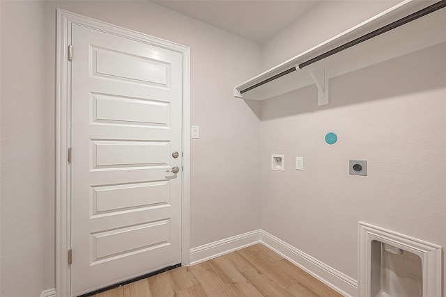laundry room featuring hookup for an electric dryer, light wood-type flooring, baseboards, laundry area, and washer hookup
