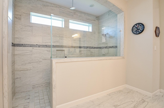1310 Layla Sage Loop, Richmond, TX 77406 - full bathroom featuring baseboards, walk in shower, and marble finish floor