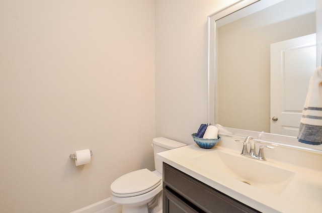 1310 Layla Sage Loop, Richmond, TX 77406 - bathroom with toilet, vanity, and baseboards
