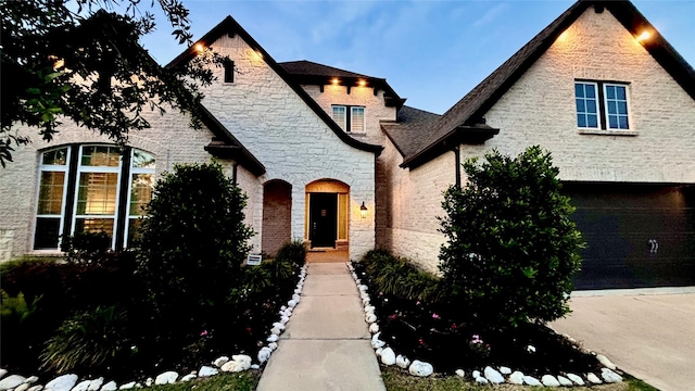 1310 Layla Sage Loop, Richmond, TX 77406 - view of front of home with brick siding, stone siding, and a garage