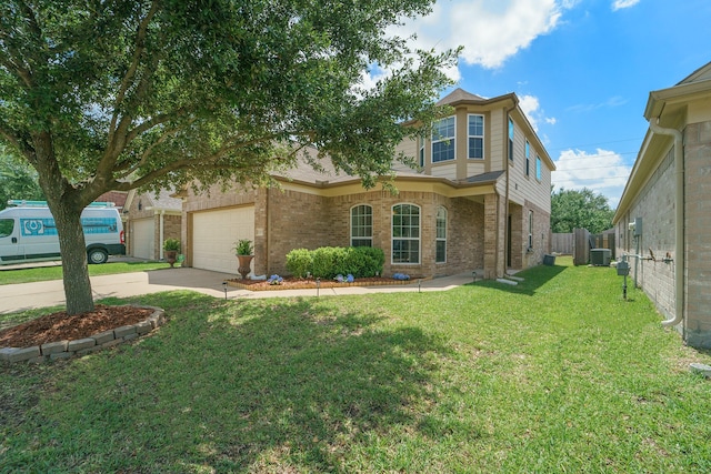 19819 Sloan Ridge Ln, Cypress, TX 77429 - traditional-style house featuring driveway, brick siding, central AC unit, and a garage