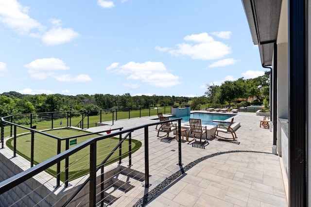 balcony featuring a patio