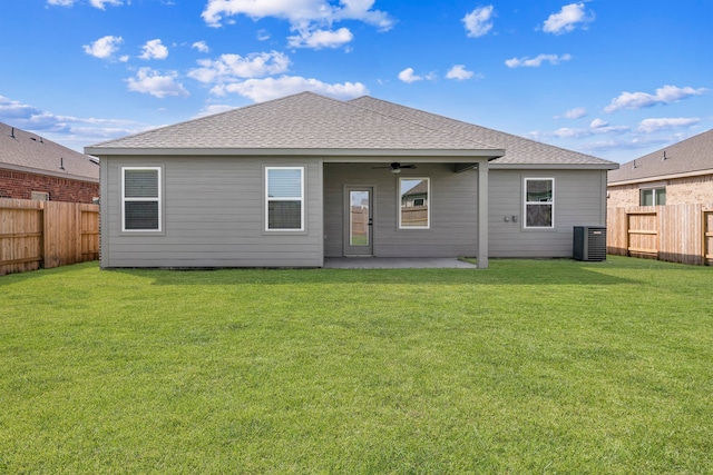 rear view of house featuring a fenced backyard, central AC unit, a patio area, and ceiling fan