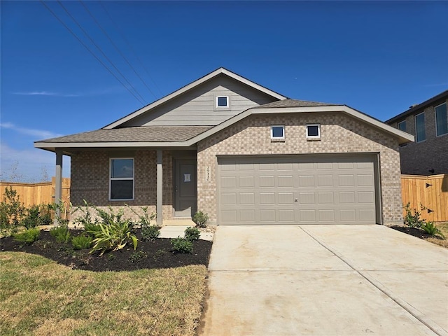 289 Douglas Hills Dr, Magnolia, TX 77354 - view of front of house featuring a garage, brick siding, driveway, and roof with shingles