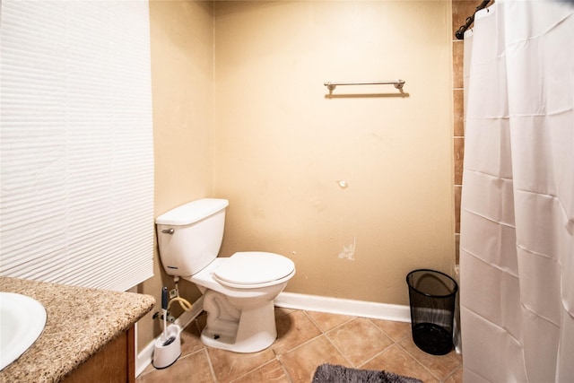 2817 Southmore Blvd, Houston, TX 77004 - bathroom featuring vanity, tile patterned floors, toilet, baseboards, and a shower with shower curtain