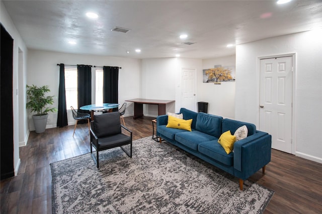 2817 Southmore Blvd, Houston, TX 77004 - living area featuring baseboards, visible vents, wood finished floors, and recessed lighting