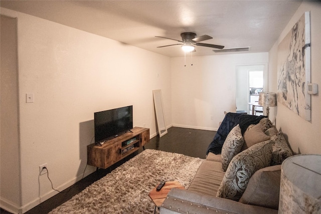2817 Southmore Blvd, Houston, TX 77004 - living room with baseboards, visible vents, and a ceiling fan