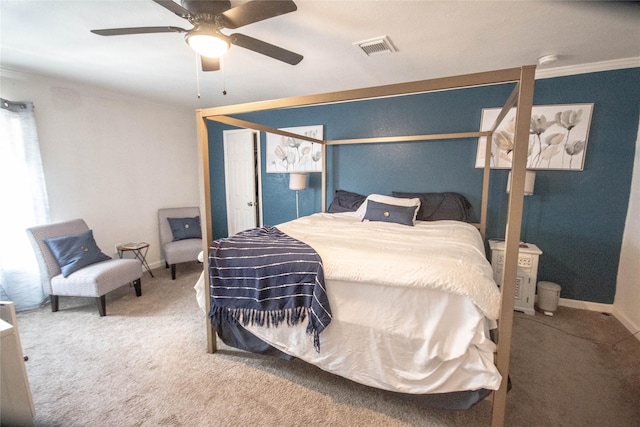 2817 Southmore Blvd, Houston, TX 77004 - carpeted bedroom with visible vents, a ceiling fan, ornamental molding, and baseboards