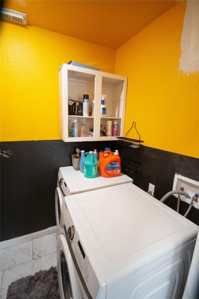 2817 Southmore Blvd, Houston, TX 77004 - washroom with visible vents, marble finish floor, laundry area, and washing machine and dryer