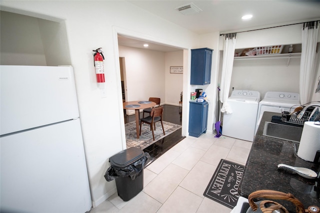 2817 Southmore Blvd, Houston, TX 77004 - laundry area with light tile patterned floors, visible vents, washer and clothes dryer, recessed lighting, and laundry area