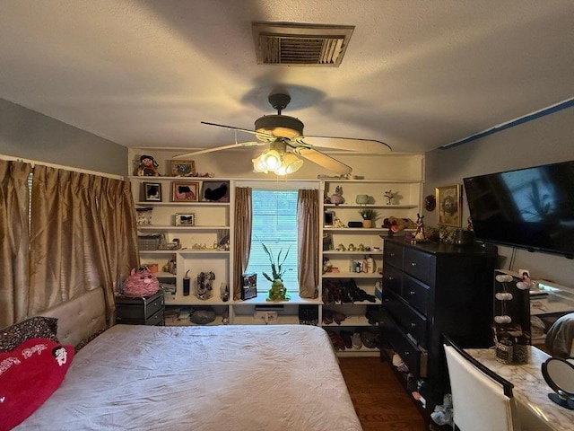 9341 Rosstown Way, Houston, TX 77080 - bedroom featuring wood finished floors and a ceiling fan