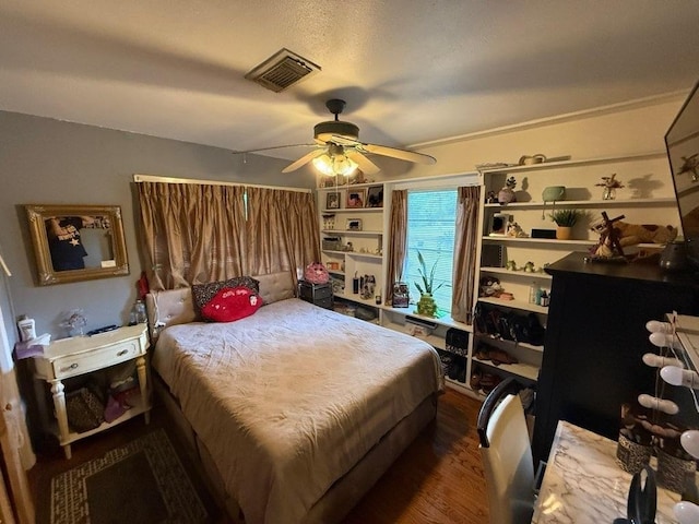 9341 Rosstown Way, Houston, TX 77080 - bedroom featuring wood finished floors and ceiling fan