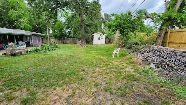 9341 Rosstown Way, Houston, TX 77080 - view of yard featuring a shed and an outdoor structure