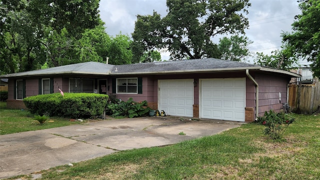 9341 Rosstown Way, Houston, TX 77080 - single story home featuring an attached garage, brick siding, and concrete driveway