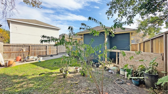 view of yard featuring a fenced backyard