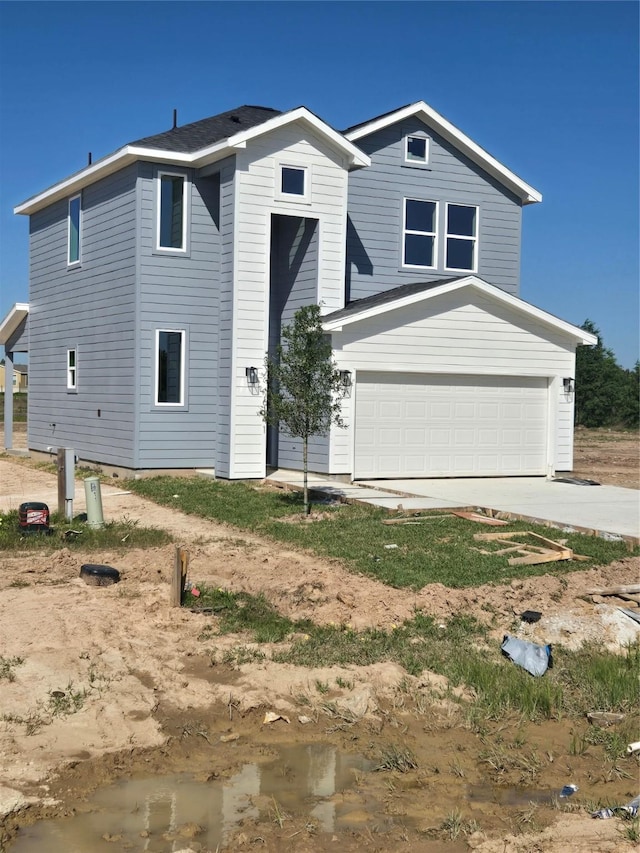 6149 Rd 5503, Cleveland, TX 77327 - traditional-style house with driveway and a garage