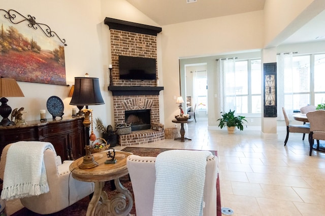 11903 Muir Groves Trl, Humble, TX 77346 - tiled living room featuring lofted ceiling and a brick fireplace