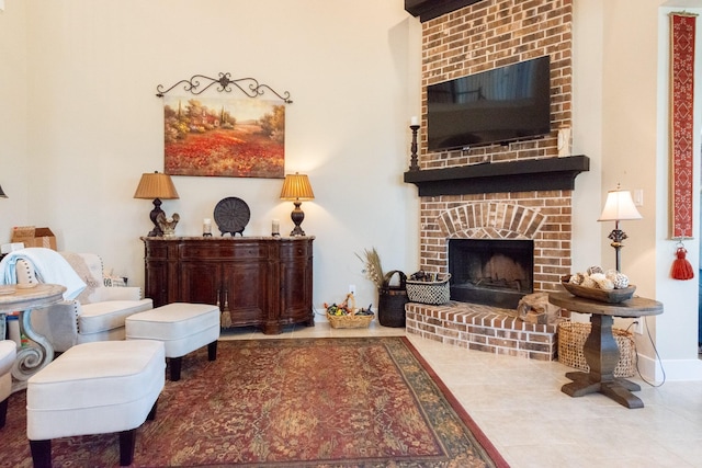 11903 Muir Groves Trl, Humble, TX 77346 - sitting room with a brick fireplace and tile patterned flooring