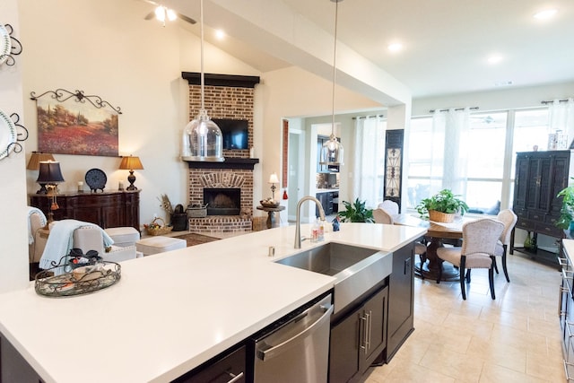 11903 Muir Groves Trl, Humble, TX 77346 - kitchen featuring light countertops, open floor plan, a sink, and dishwasher