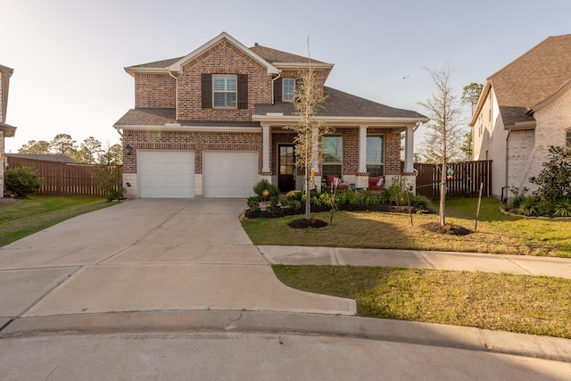 11903 Muir Groves Trl, Humble, TX 77346 - view of front of property with brick siding, an attached garage, concrete driveway, a shingled roof, and a porch
