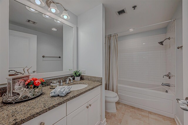 801 E Beach Dr Unit Tw1012, Galveston, TX 77550 - bathroom with toilet, vanity, shower / tub combo with curtain, tile patterned floors, and recessed lighting