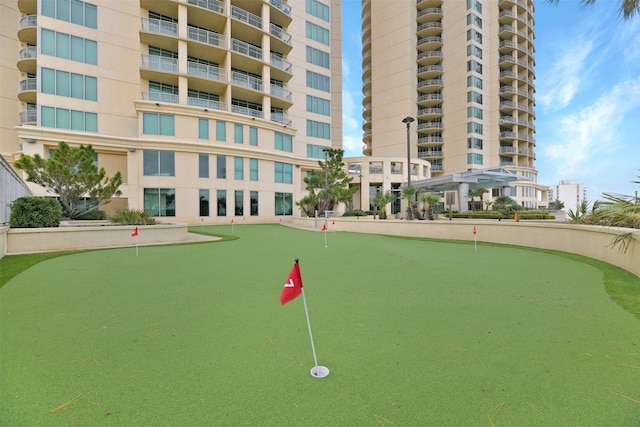 801 E Beach Dr Unit Tw1012, Galveston, TX 77550 - view of property's community with a putting green