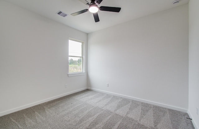1920 1st St, Hempstead, TX 77445 - carpeted spare room with baseboards, visible vents, and ceiling fan