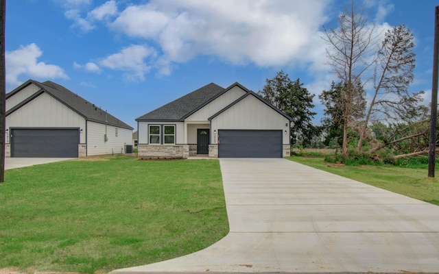1920 1st St, Hempstead, TX 77445 - modern farmhouse style home featuring board and batten siding, a front lawn, central AC, and concrete driveway