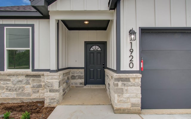 1920 1st St, Hempstead, TX 77445 - property entrance with stone siding and board and batten siding