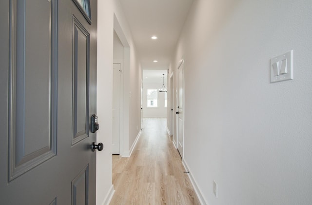 1920 1st St, Hempstead, TX 77445 - corridor featuring baseboards, light wood finished floors, and recessed lighting
