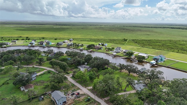 aerial view featuring a rural view and a water view