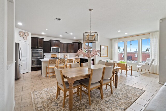 dining area featuring visible vents, recessed lighting, and light tile patterned floors