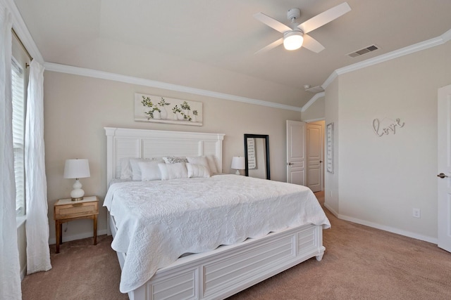 bedroom featuring vaulted ceiling, visible vents, carpet flooring, and crown molding