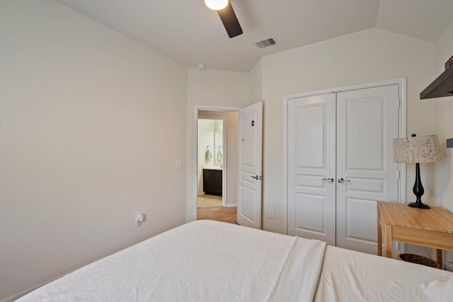 bedroom with a ceiling fan, visible vents, and a closet
