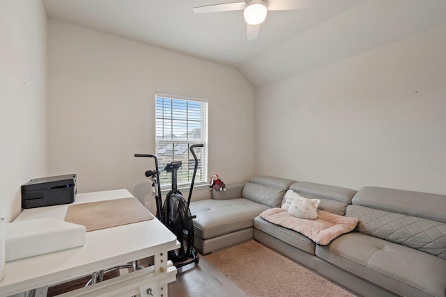 office area featuring vaulted ceiling, wood finished floors, and ceiling fan