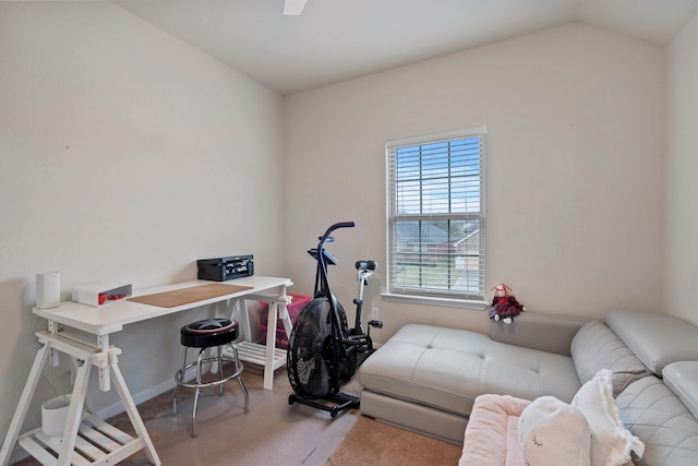 office with lofted ceiling and baseboards