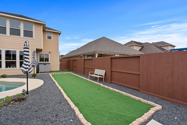 view of yard featuring a fenced backyard