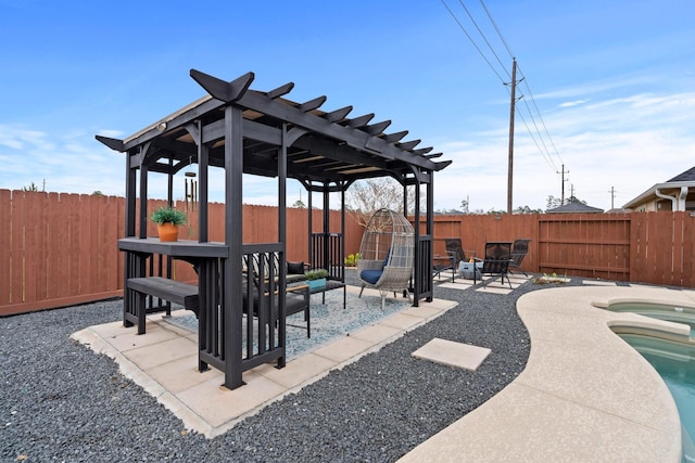 view of patio featuring a jacuzzi, a fenced backyard, an outdoor fire pit, and a pergola