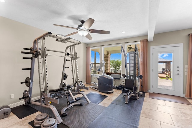workout room with recessed lighting, a textured ceiling, baseboards, and ceiling fan