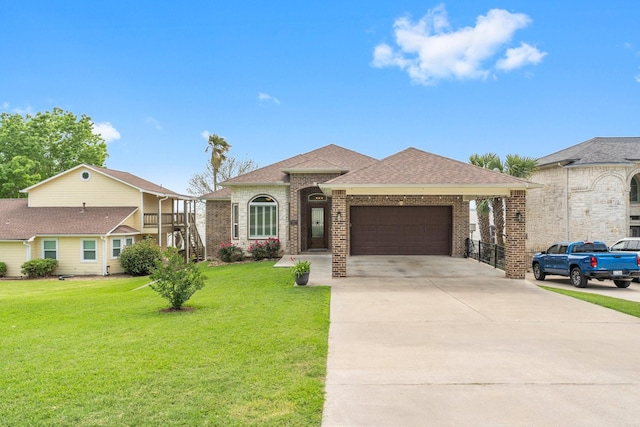 view of front of house featuring driveway, an attached garage, a front yard, brick siding, and roof with shingles