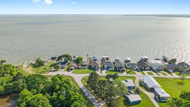 birds eye view of property with a residential view and a water view