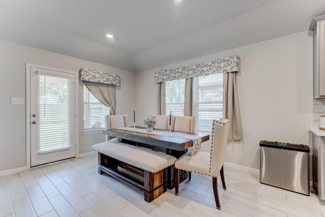 dining area featuring recessed lighting, light wood-style flooring, and baseboards