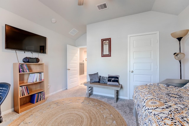 bedroom with vaulted ceiling, carpet floors, baseboards, and visible vents
