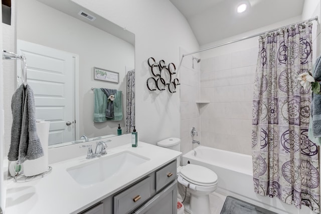 full bathroom featuring toilet, visible vents, lofted ceiling, shower / bathtub combination with curtain, and vanity