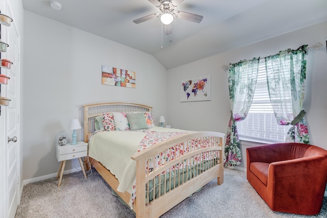 bedroom featuring vaulted ceiling, a ceiling fan, carpet flooring, and baseboards