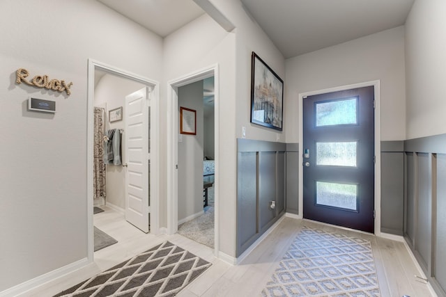 entryway with light wood-style flooring
