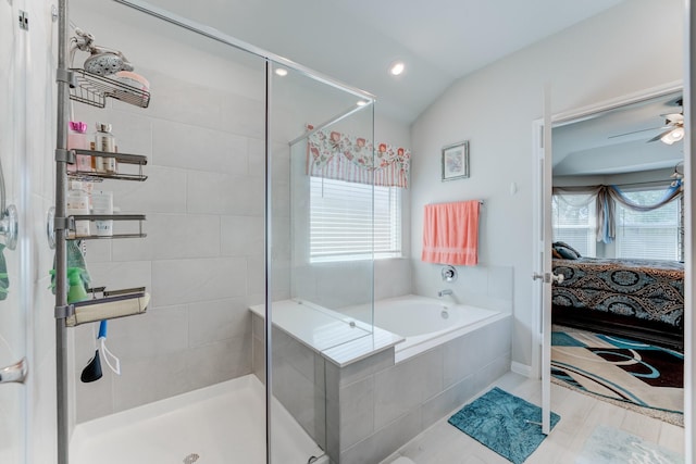 ensuite bathroom featuring a stall shower, recessed lighting, lofted ceiling, a garden tub, and connected bathroom