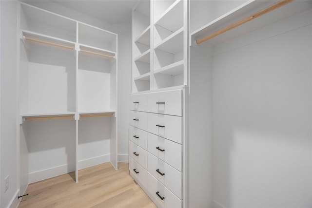 walk in closet featuring light wood-type flooring