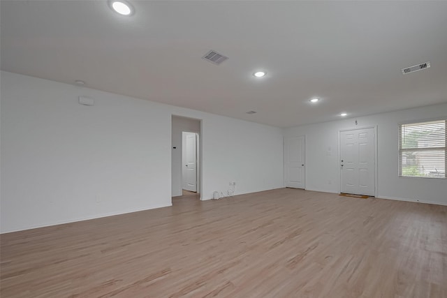24119 Maple Turn Ln, Hockley, TX 77447 - interior space with recessed lighting, visible vents, light wood finished floors, and baseboards