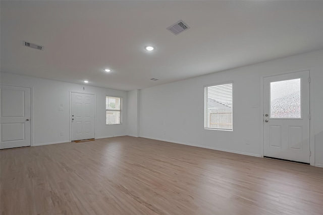 24119 Maple Turn Ln, Hockley, TX 77447 - foyer entrance featuring baseboards, visible vents, light wood finished floors, and recessed lighting